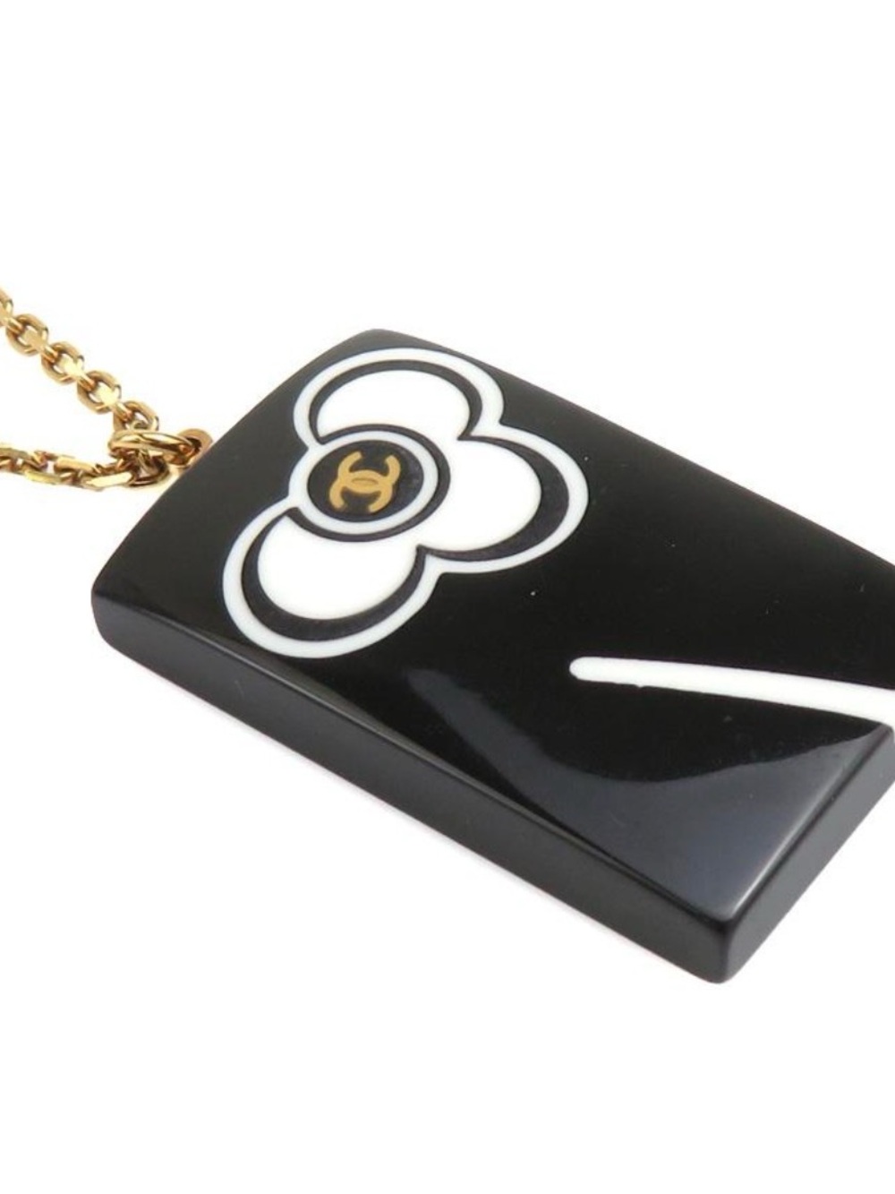 CHANEL Black and White Camellia Pendant with Gold Chain